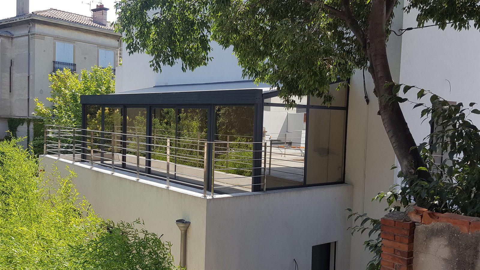 Véranda aluminium anthracite terrasse